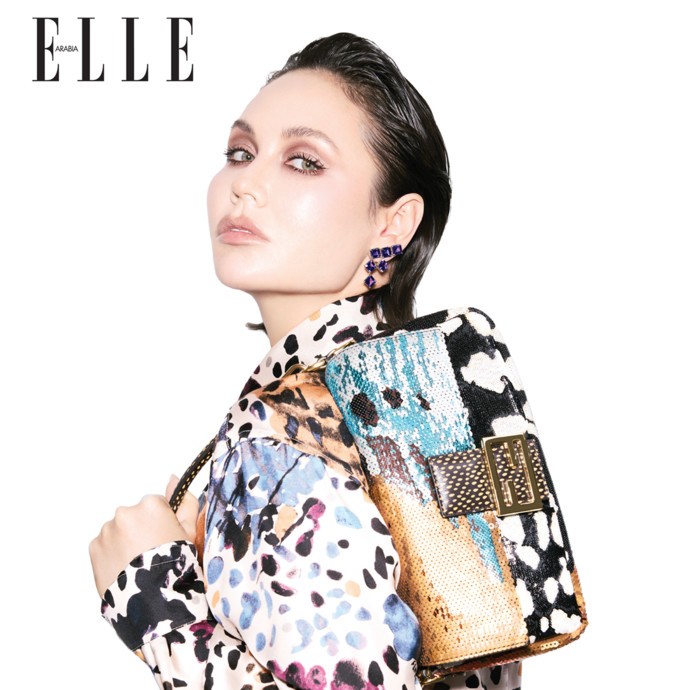 تخبرنا عارضة الأزياء ونجمة التلفزيون Liasan Utiasheva عن مسيرتها كلاعبة جمباز