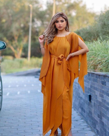 ما سرّ هوس النجمات العرب بهذا الفستان الخردلي؟
