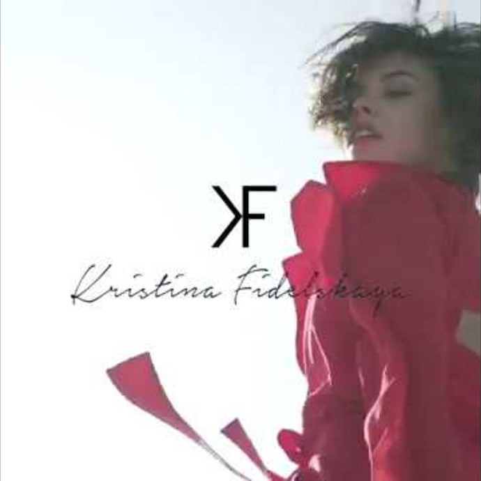 Kristina Fidelskaya's Red Dress x Elle Arabia